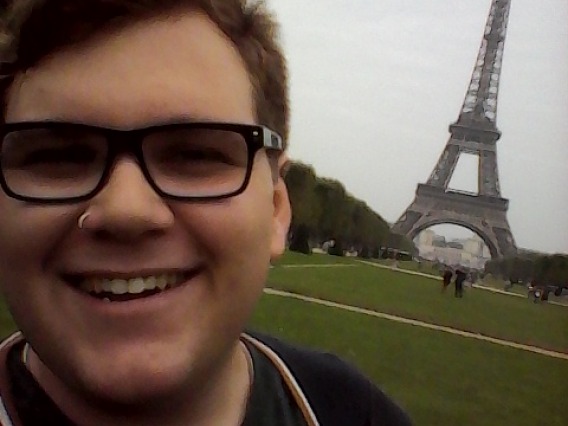 Student Billy in front of Eiffel Tower